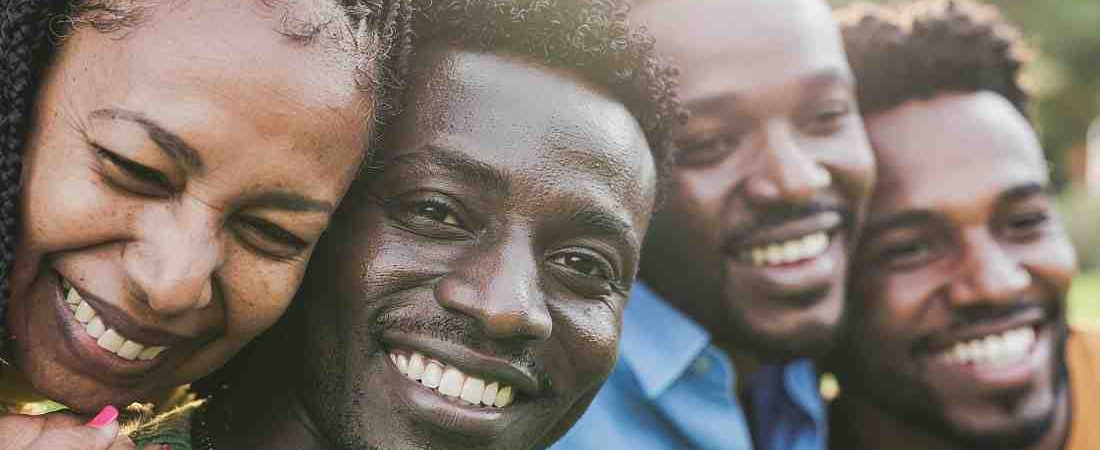Black queer youth creating visual art during a community workshop in the diaspora.