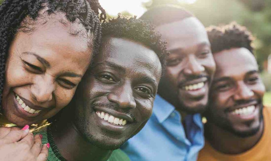Black queer youth creating visual art during a community workshop in the diaspora.