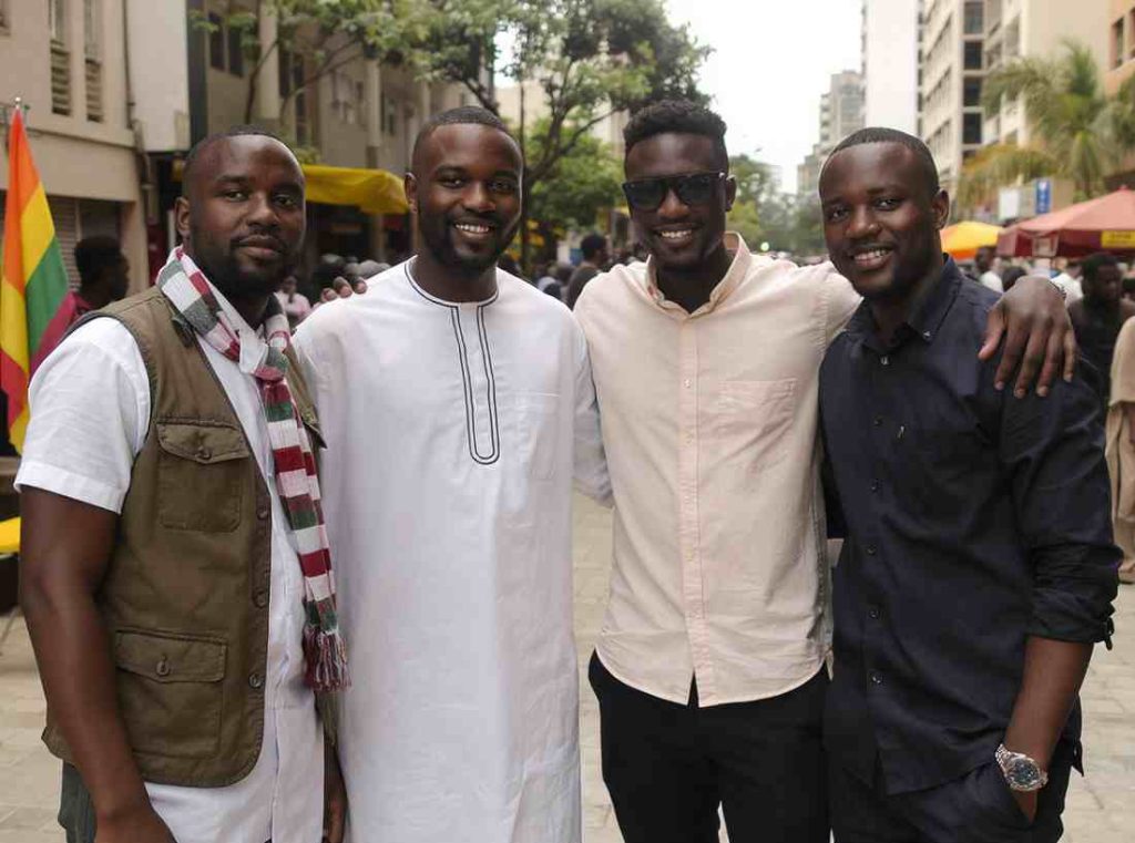 four black gay men looking happy talks healing from shame and stigma through support networks